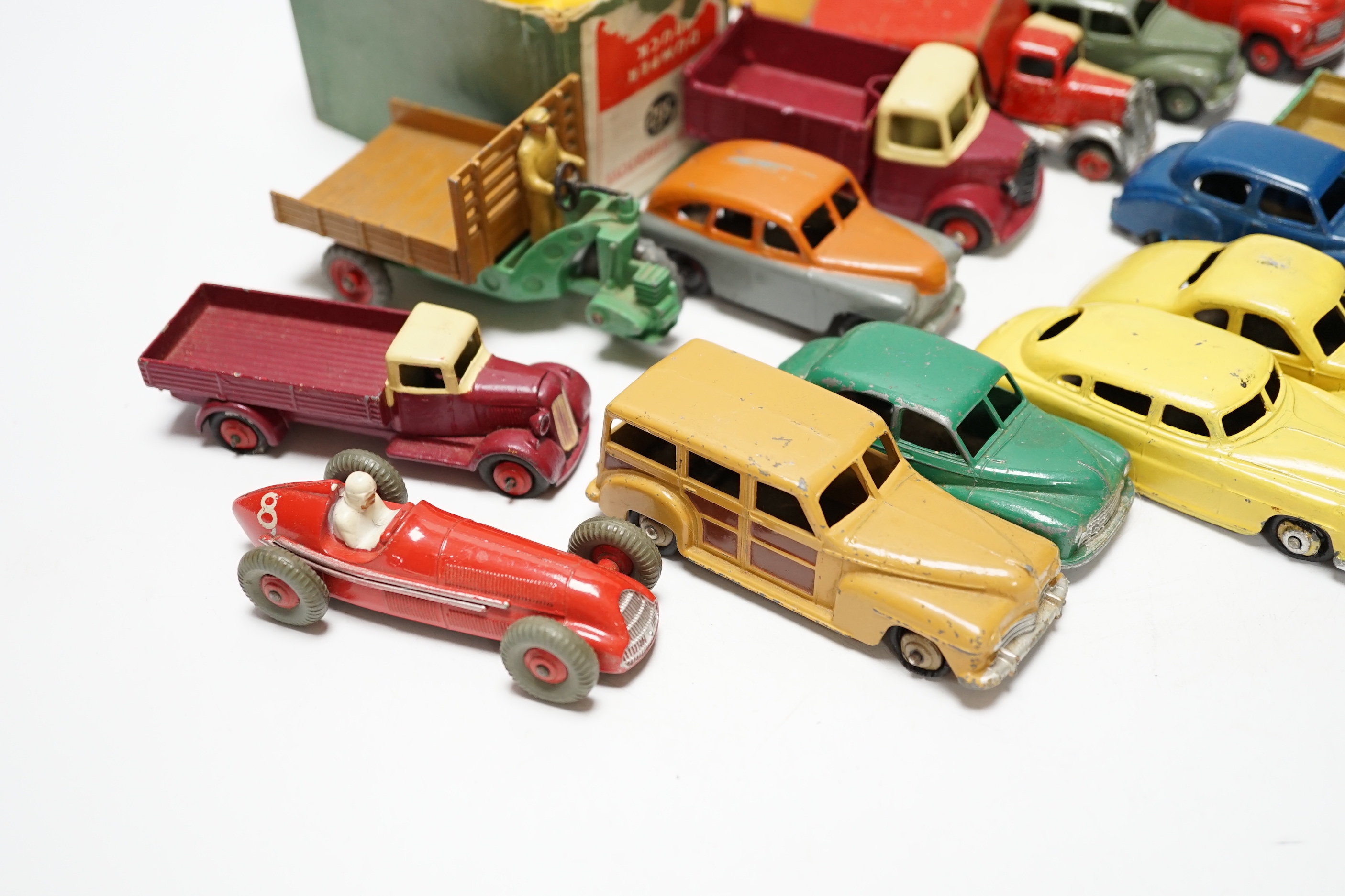 Nineteen Dinky Toys including; Mobilgas Tanker, Ford Sedan, Austin Devon, Austin Somerset, Standard Vanguard, Bedford Tipper, Hudson Sedan, etc.